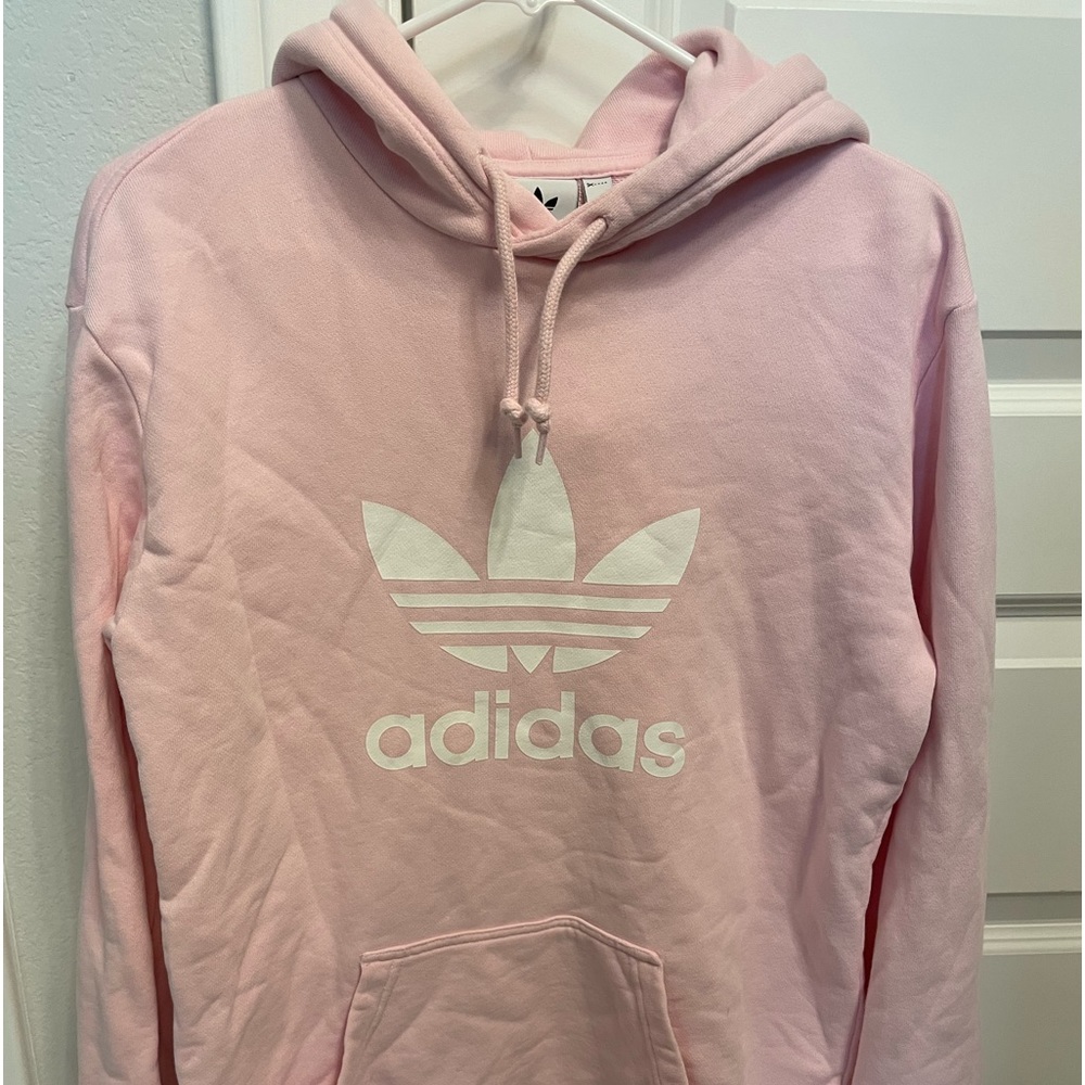 Adidas hoodie, size small womens but fits bigger.